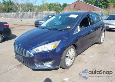 2016 Ford Focus Titanium z USA, uszkodzony, nr VIN 1FADP3N20GL254072